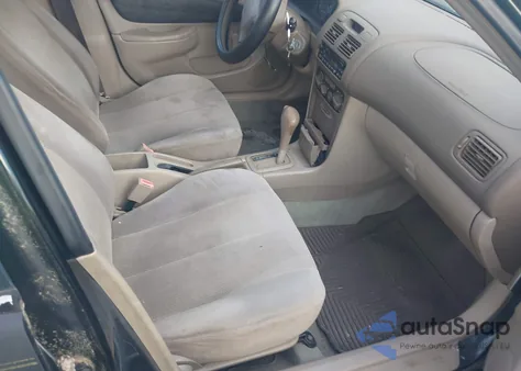 2001 Toyota Corolla Ce from USA, damaged, VIN 1NXBR12E01Z475117